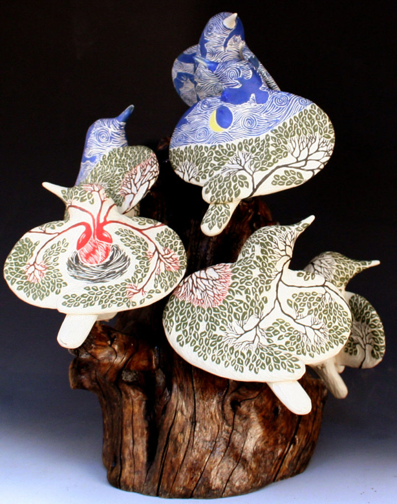cathy weber - art - clay - woman - montana - ceramic - porcelain - bird - red wing - phases - forest - carved - moon - tree - hand - heart