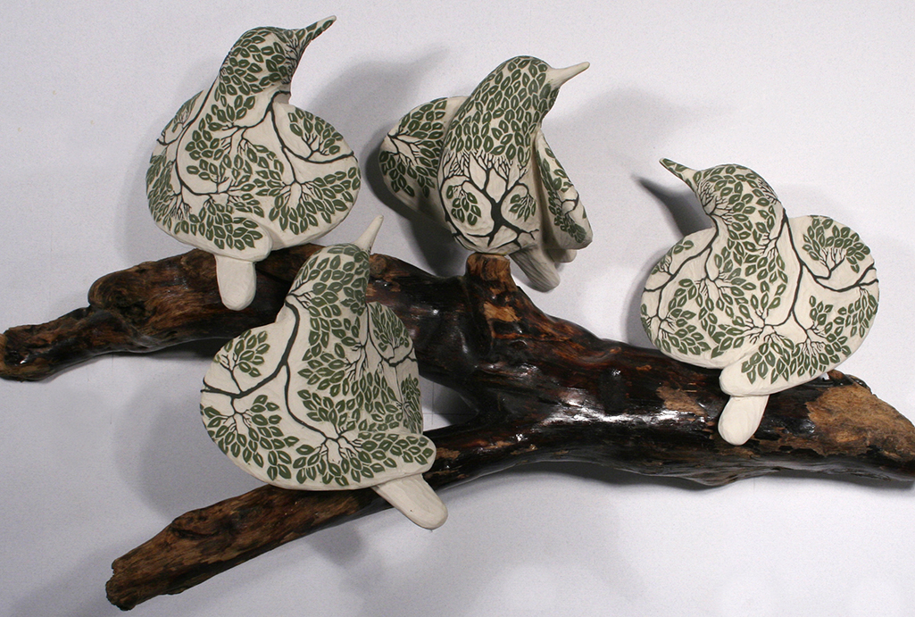 cathy weber - art - clay - woman - montana - ceramic - porcelain - bird - red wing - phases - forest - carved -forest - tree